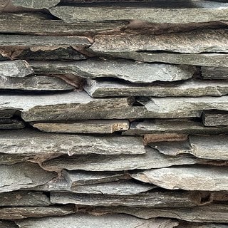 Tonos de Vallado Rústico Gris: gris, gris perla, gris claro, en un acercamiento de la muestra real